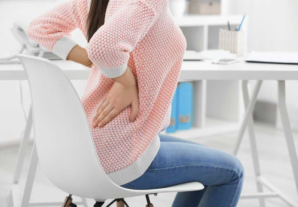 Reasons for Lower Back in Women (& What to Do About It)